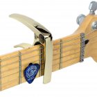 Gold Capo on Electric Guitar